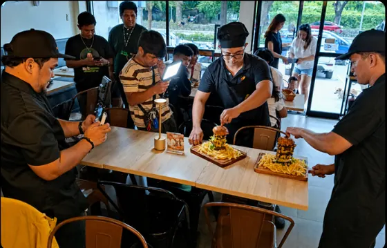 Clickwave crew shooting food content around a restaurant table